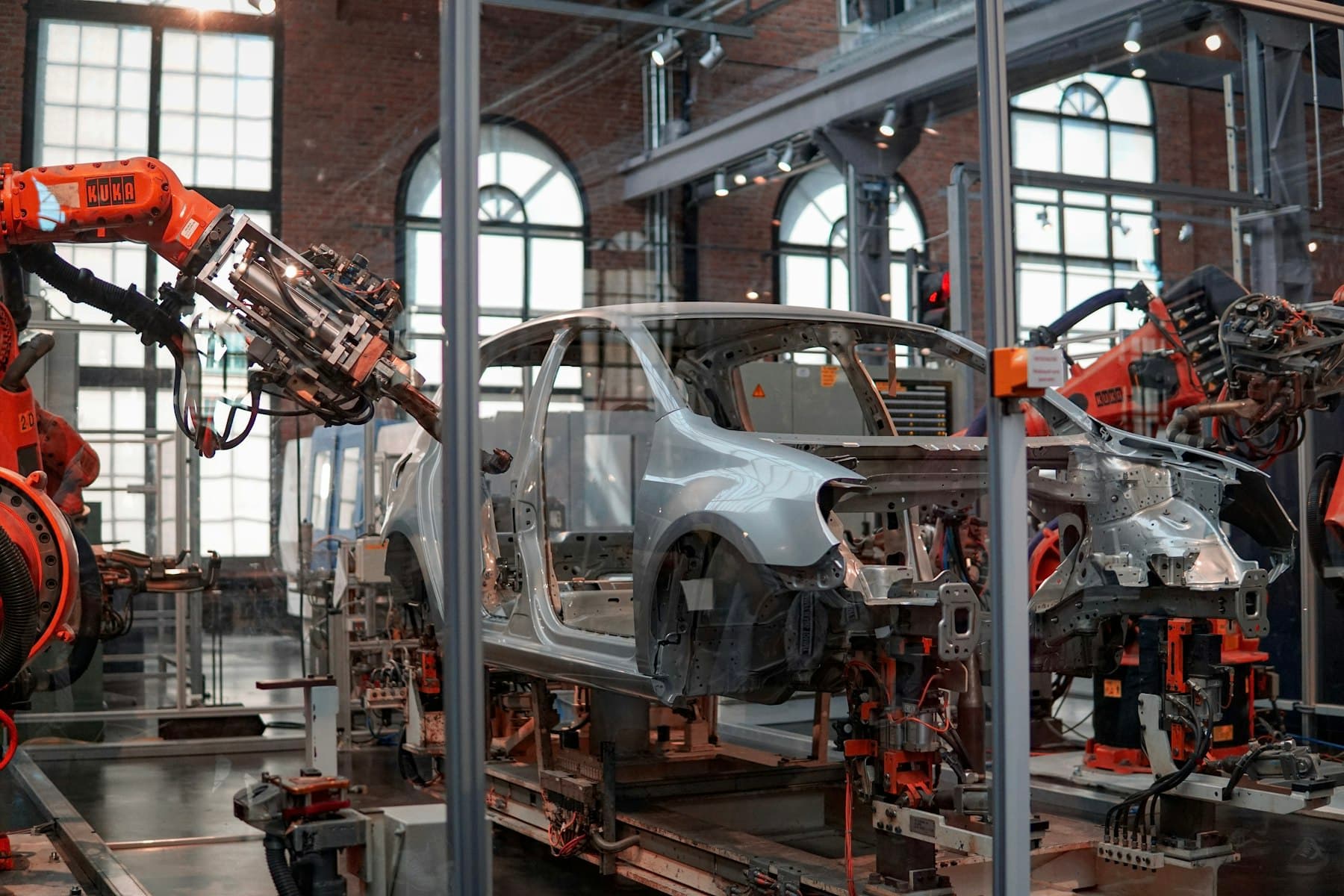 Automated robotic arms operating on a Chebez production line